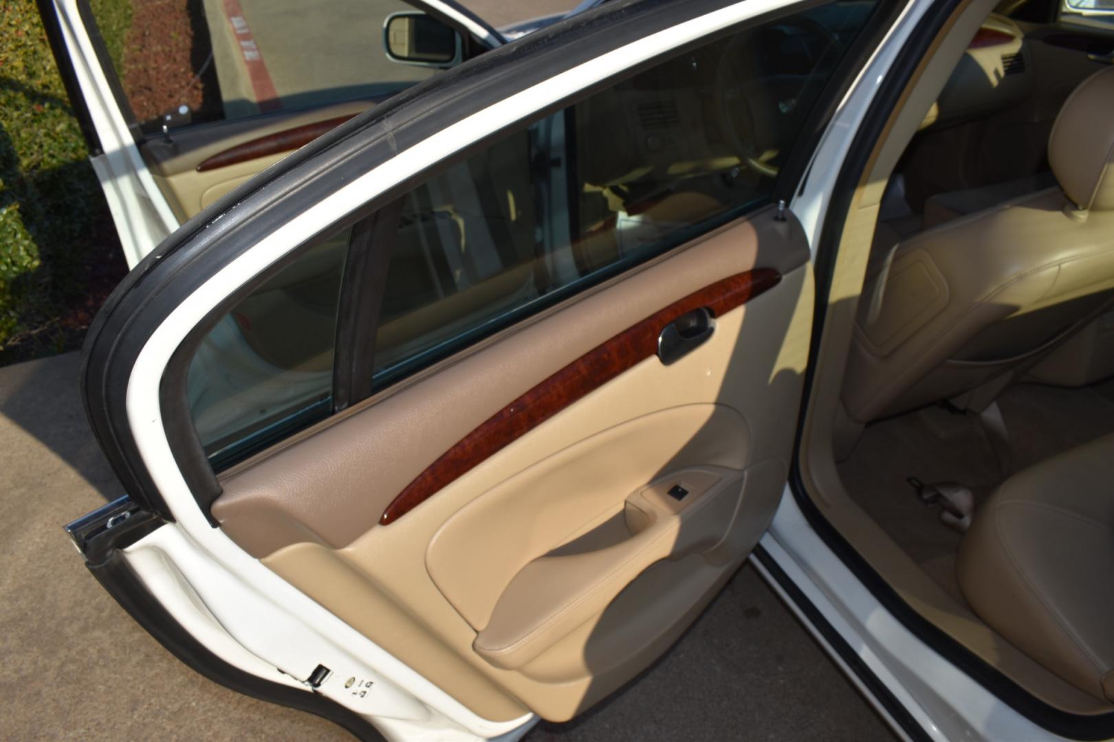 2006 White /Tan Buick Lucerne CXL (1G4HR57Y06U) with an 4.6L V8 engine, 4-Speed Automatic Overdrive transmission, located at 5925 E. BELKNAP ST., HALTOM CITY, TX, 76117, (817) 834-4222, 32.803799, -97.259003 - Deciding to buy a specific car model, such as the 2006 Buick Lucerne CXL V8, depends on various factors and personal preferences. Here are some potential reasons why you might consider purchasing this particular vehicle: Powerful Engine: The V8 engine in the Buick Lucerne CXL provides ample power a - Photo#17